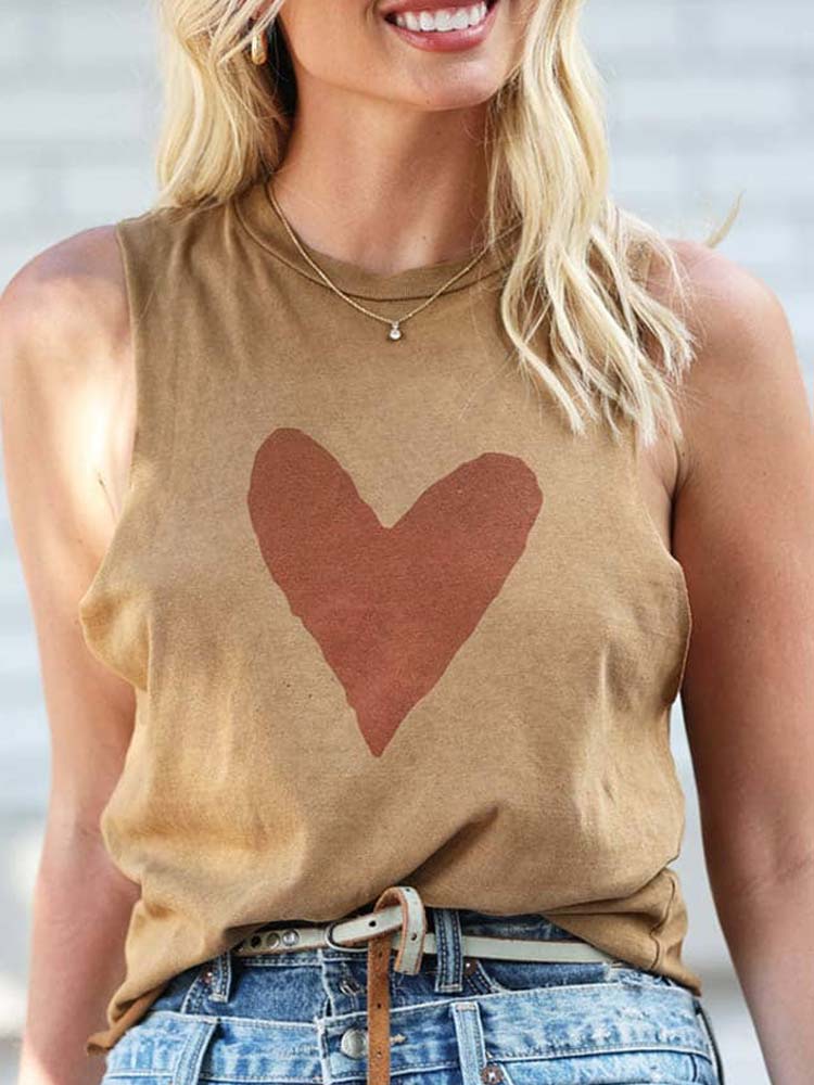 Pink heart on yellow crop top