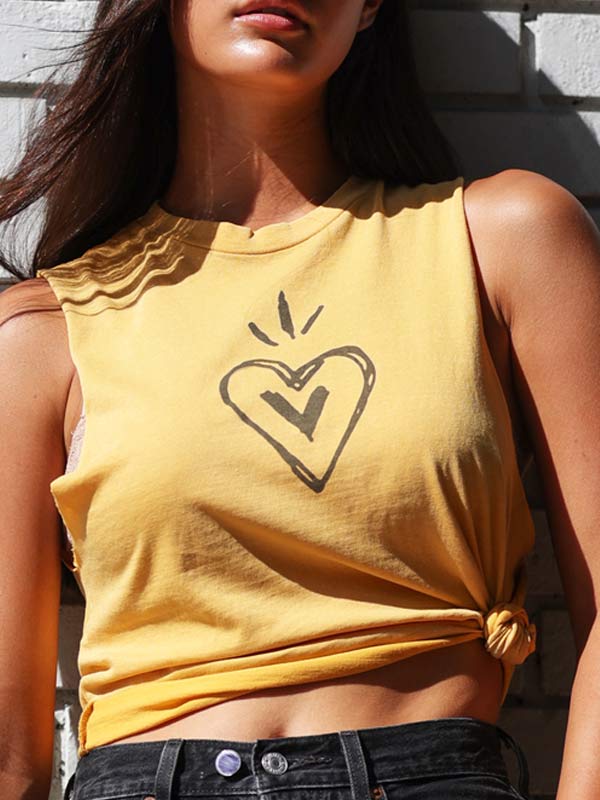 Yellow crop top with a folk heart screen print