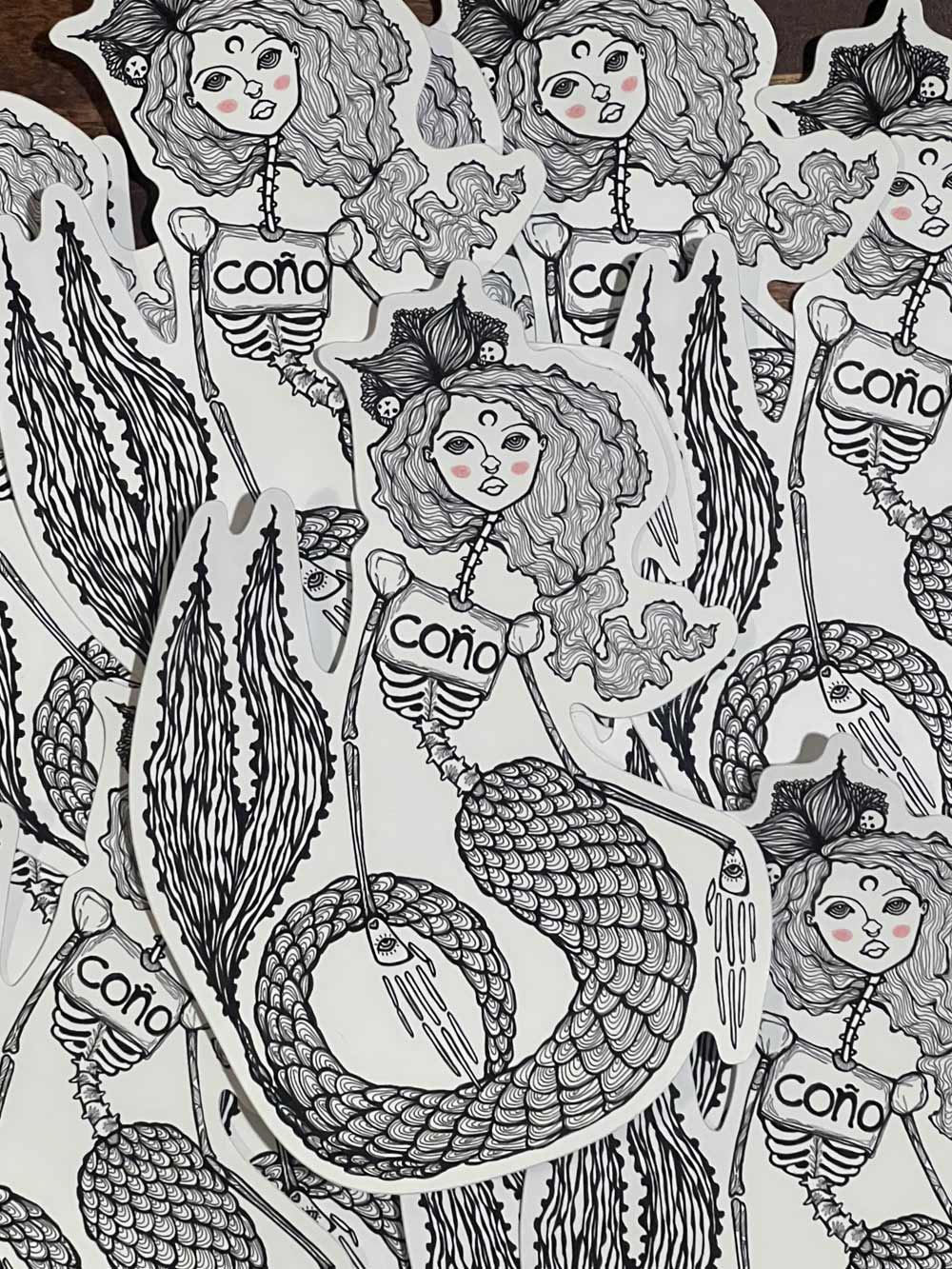 Mermaid Sticker with shirt that says "Cono"