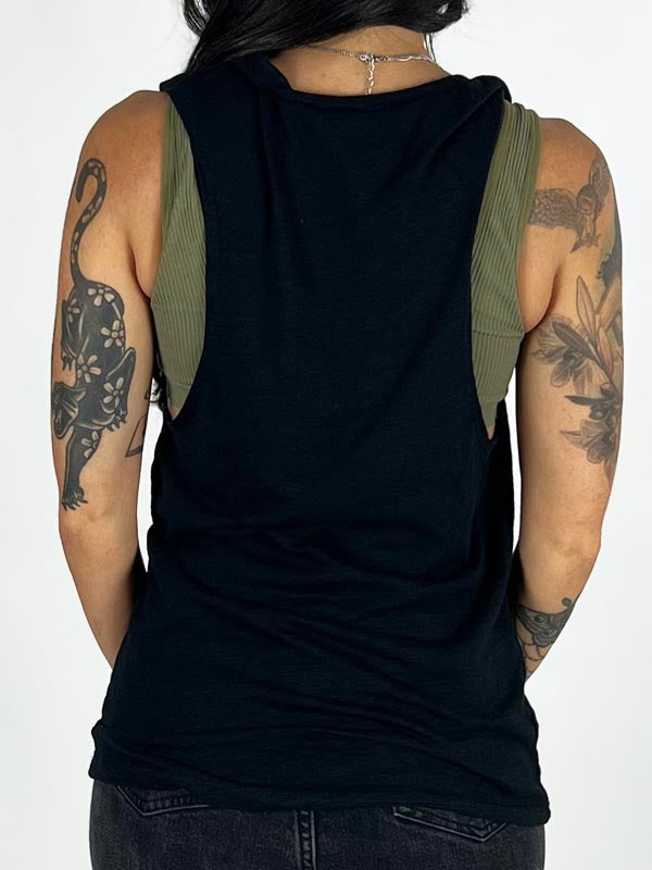 back of model wearing black tank top