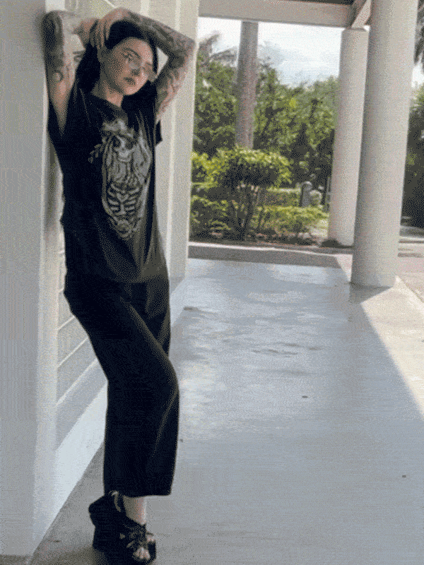 Model wearing the shirt, showing movement.