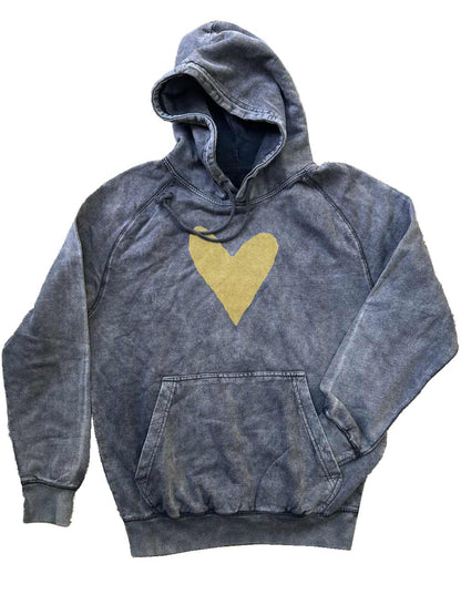 Faded Black hoodie with a gold heart on a white background