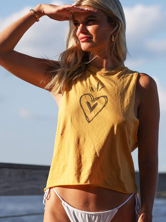 Folk heart design on a yellow crop top