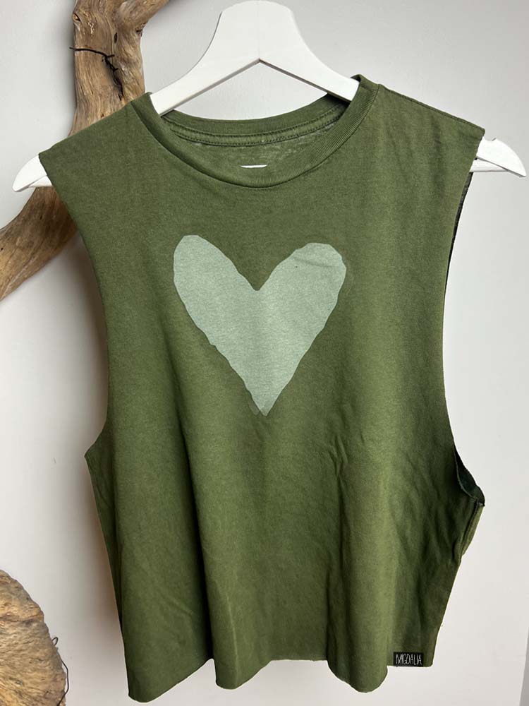 Green crop with heart graphic