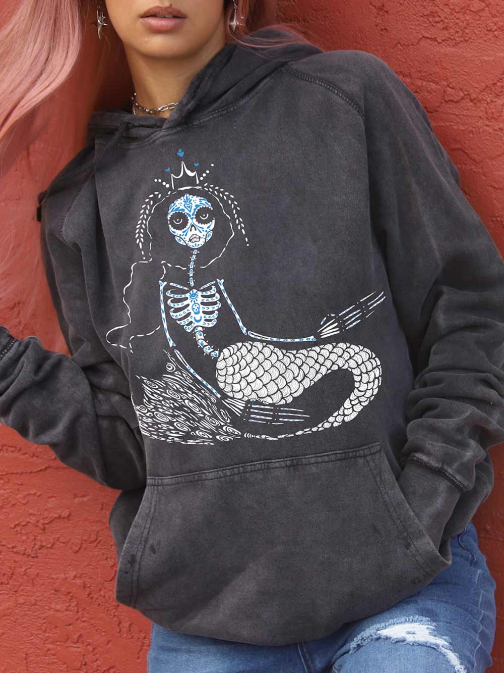 woman wearing vintage black hoodie with Mermaid Graphic.