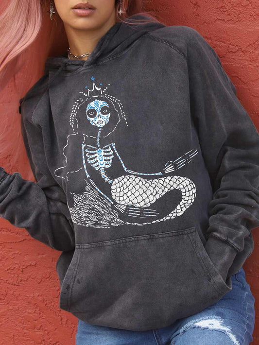 woman wearing vintage black hoodie with Mermaid Graphic.