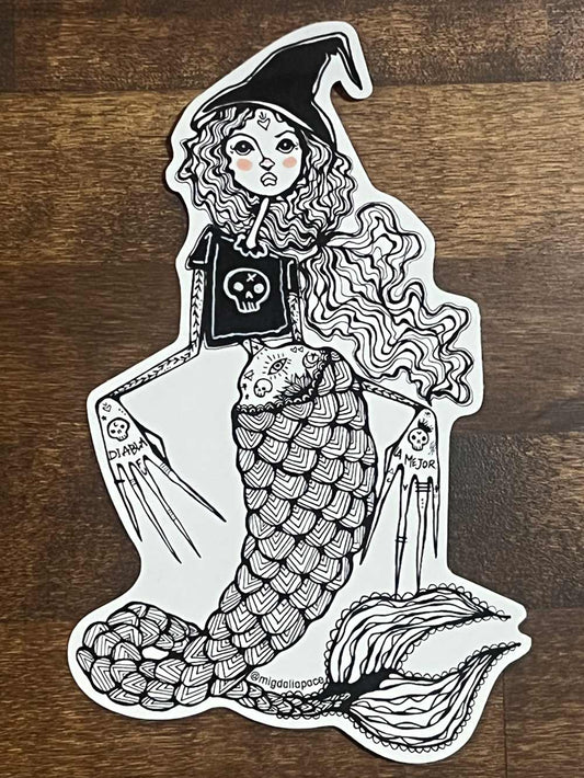 Mermaid sticker with witch hat on a wooden background