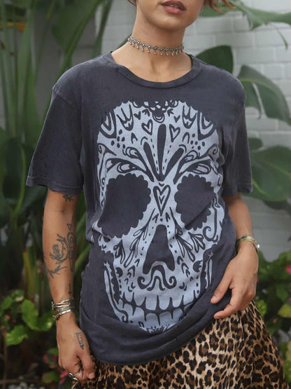 Woman wearing a Calavera graphic Tee 