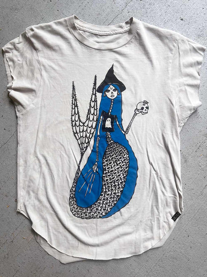 White t-shirt with a graphic design of a witch mermaid.  