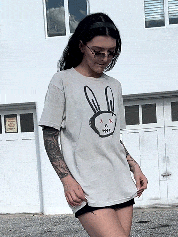 Female modeling a dead bunny rabbit graphic t-shirt. Animated GIF