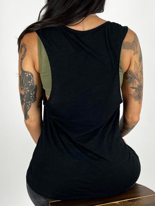 Model wearing black tank top